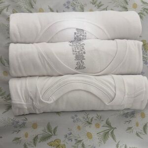 3 Kirkland white shirt brand new